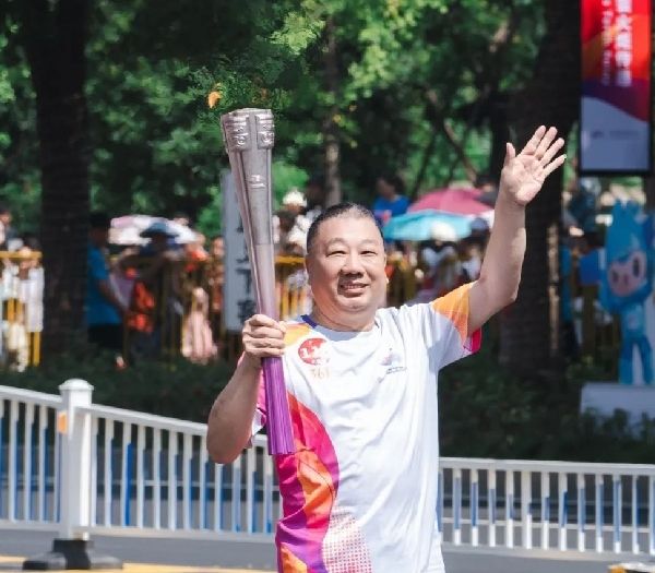 浙江suncitygroup股份董事长李国平先生圆满实现荆家世19届亚运会火炬传递